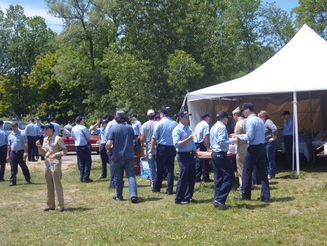 Volunteers from U.S. Navy help build Kids' Creekside Village